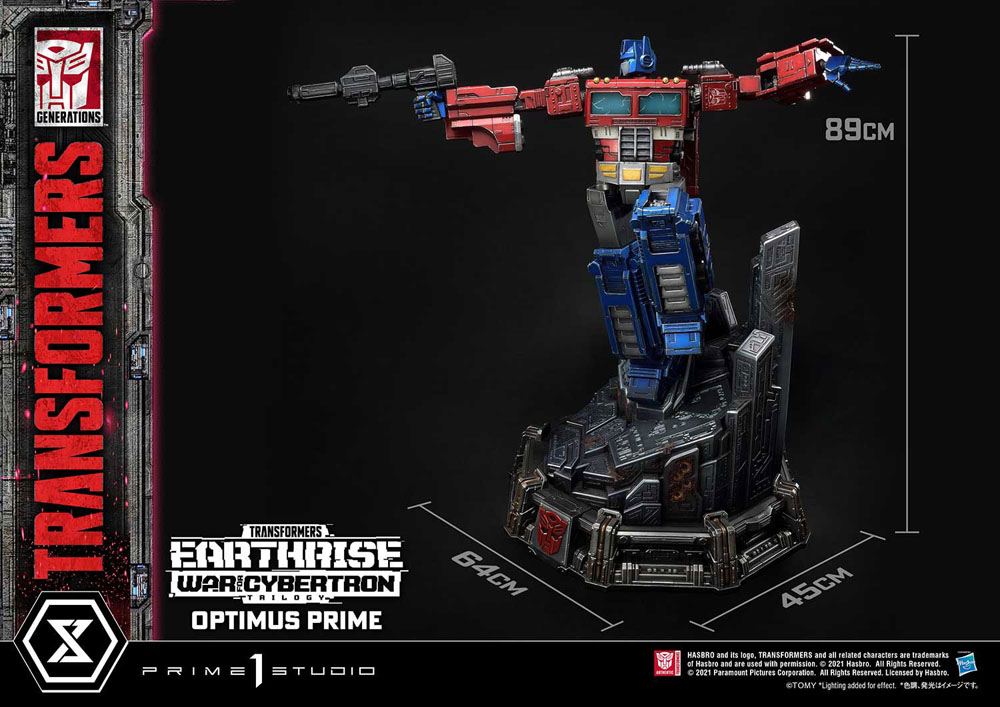 Transformers: War for Cybertron Trilogy Statue Optimus Prime 89 cm mål i cm og pistol i højre hånd